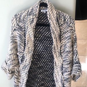 Black and Beige sweater.